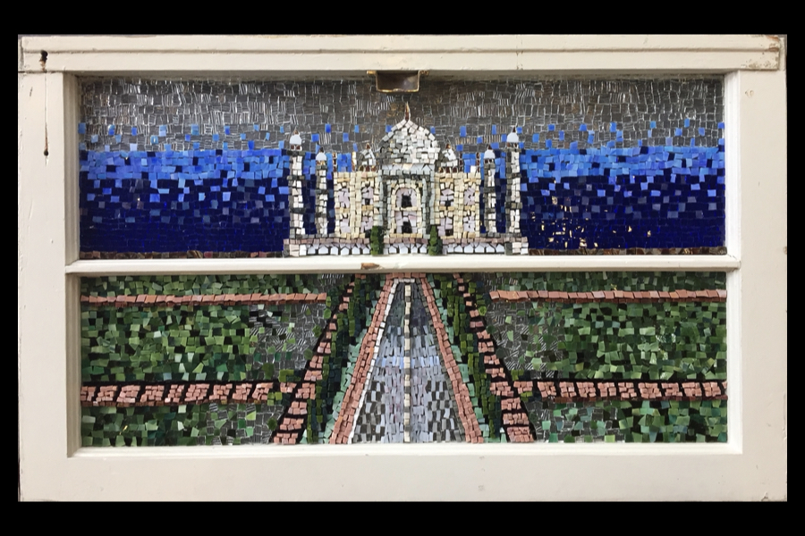 1 of 4, A mosaic of the Taj Mahal depicted on a window pane.